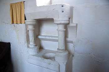Piscina on the south wall of the chancel March 2012